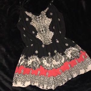 Spaghetti strap romper with pockets